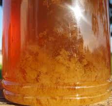 jar of honey starting to crystallise